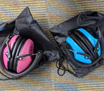 two pairs of noise cancelling headphones